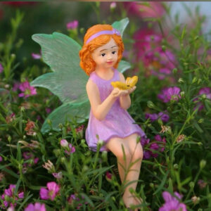 Fairy Sitting Holding Butterfly